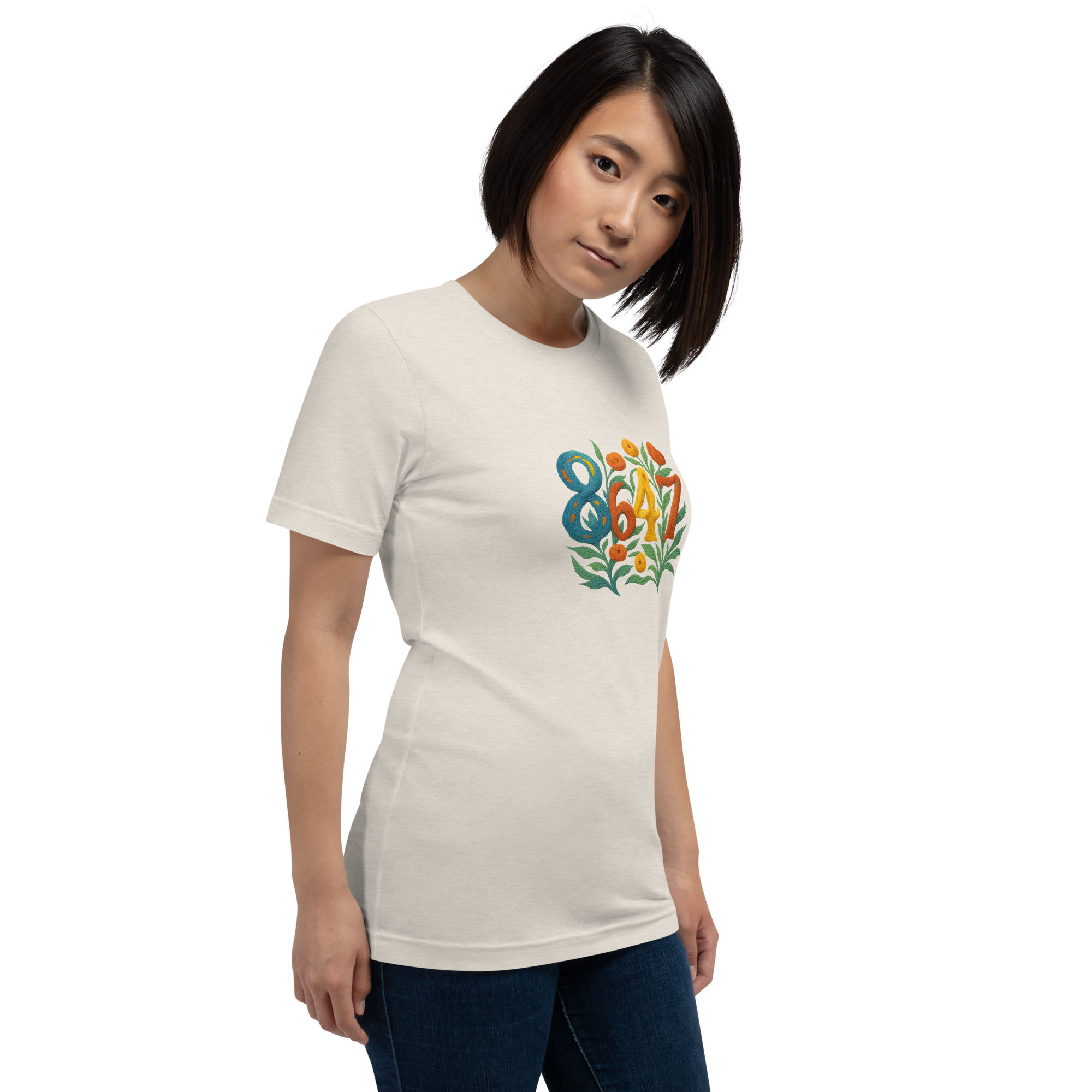Heather Dust t-shirt with a flower graphic with numbers 8647 on female